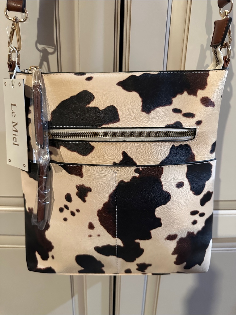 Cowhide-Print Crossbody Shoulder Bag in Brown & White by Le Miel